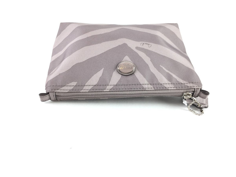 COACH CORNER ZIP WRISTLET IN SIGNATURE CANVAS WHITE/BLACK