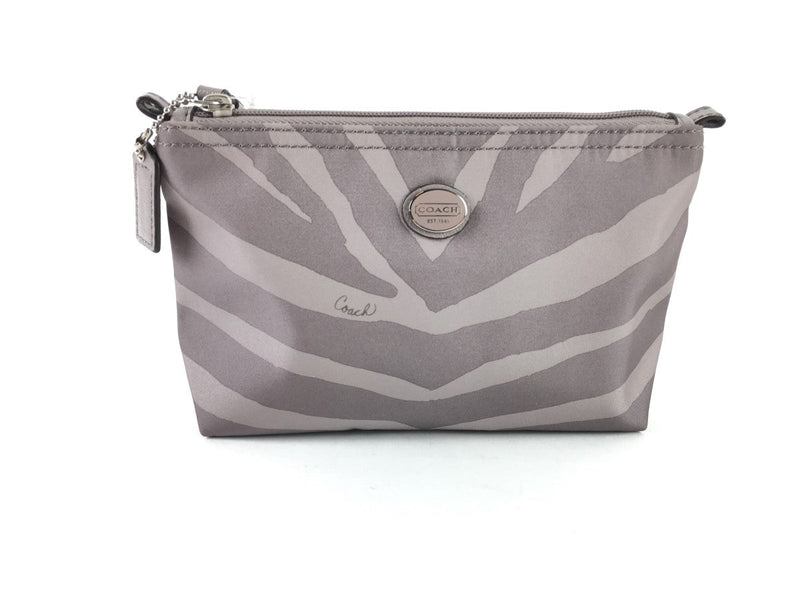 COACH CORNER ZIP WRISTLET IN SIGNATURE CANVAS WHITE/BLACK