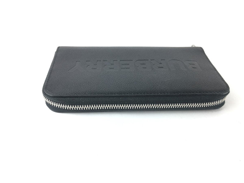 BURBERRY LOGO EMBOSSED LEATHER ZIPAROUND WALLET BLACK