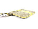 COACH CORNER ZIP WRISTLET IN SIGNATURE CANVAS YELLOW