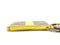 COACH CORNER ZIP WRISTLET IN SIGNATURE CANVAS YELLOW