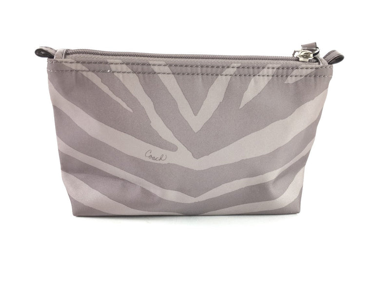 COACH CORNER ZIP WRISTLET IN SIGNATURE CANVAS WHITE/BLACK