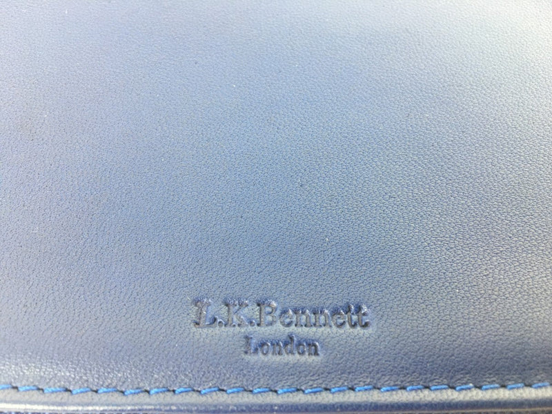 L.K. BENNETT LEATHER FOLDING CLUTCH IN BLUE